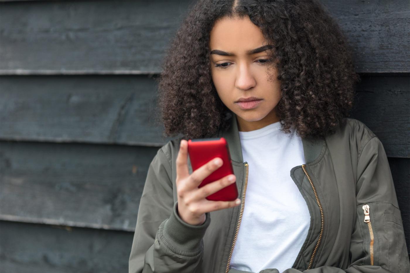 Person reviewing browsing activity on a smartphone to manage online privacy.